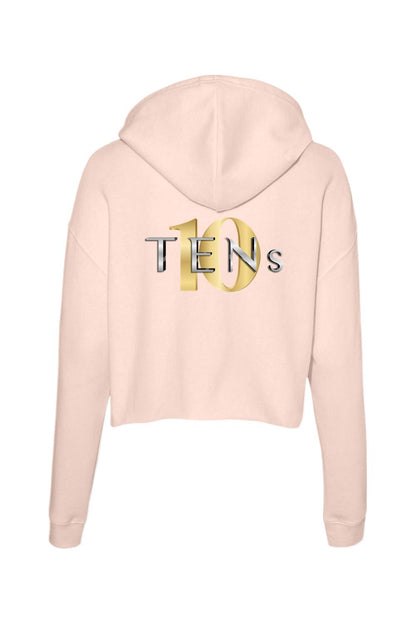 Light pink cropped cotton hoodie featuring a gold and silver TENS logo on the back.