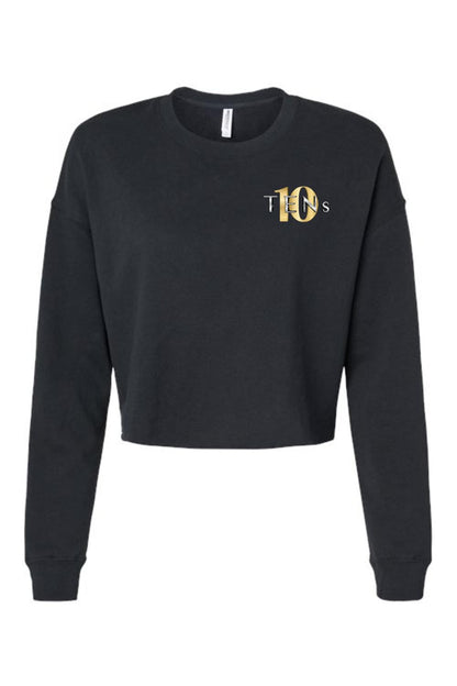 Black cropped sweatshirt with long sleeves and a gold and silver Tens Show Club logo on the left chest.