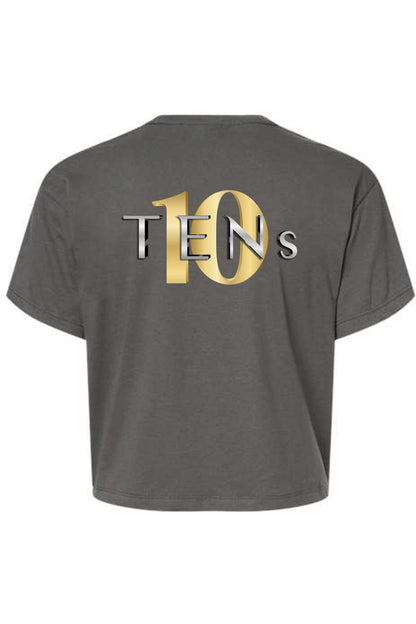 Charcoal grey cotton cropped tee featuring a metallic gold and silver TENS logo on the back.
