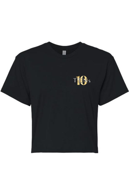 Black cotton women's cropped tee featuring a small gold and white Tens Show Club logo on the left chest.