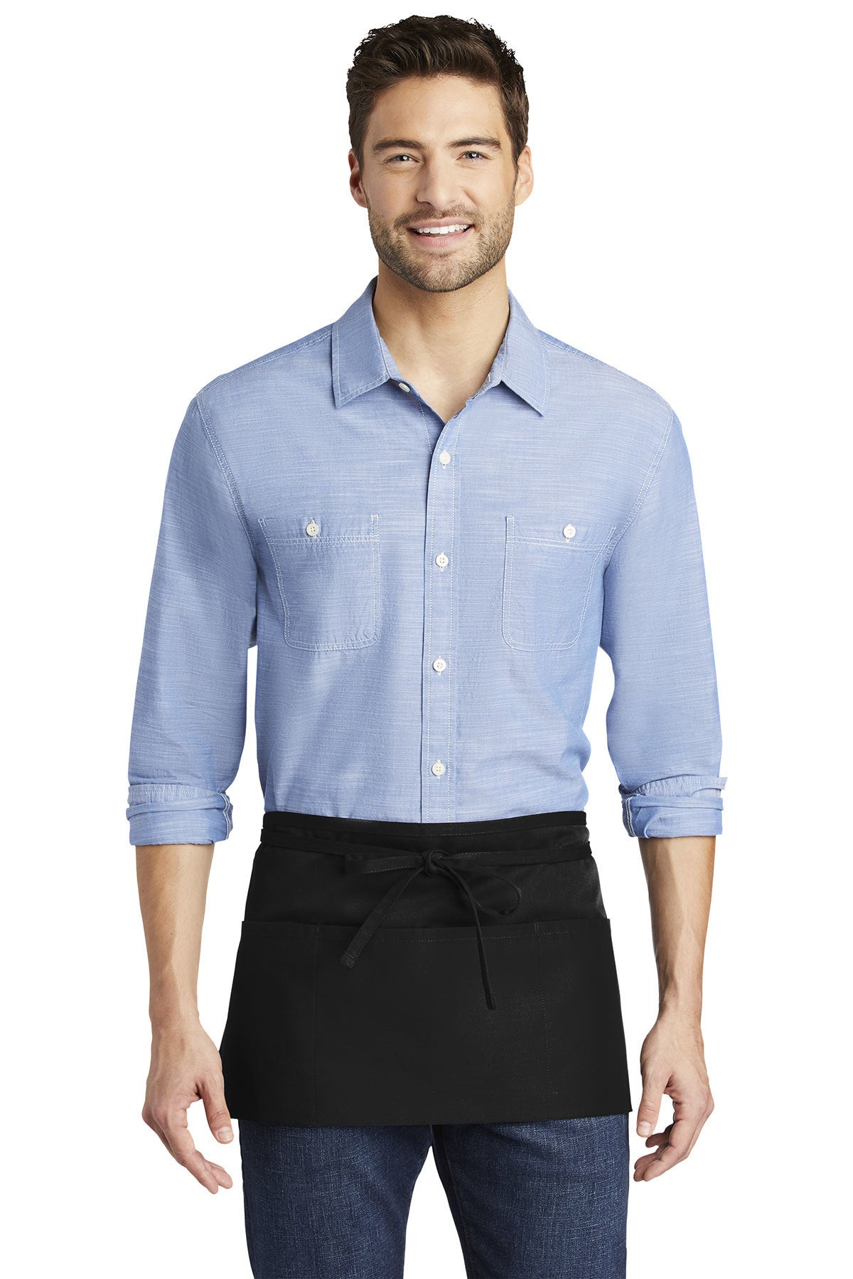 Black poly-cotton waist apron with three front pockets worn over a blue button-down shirt and jeans.