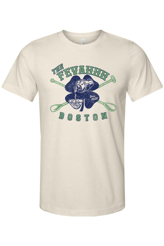 Cream-colored crew neck jersey tee featuring a green shamrock graphic with a cocktail shaker and Boston text.