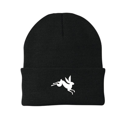 Black knit beanie featuring a white embroidered jumping bunny rabbit design on the folded cuff.