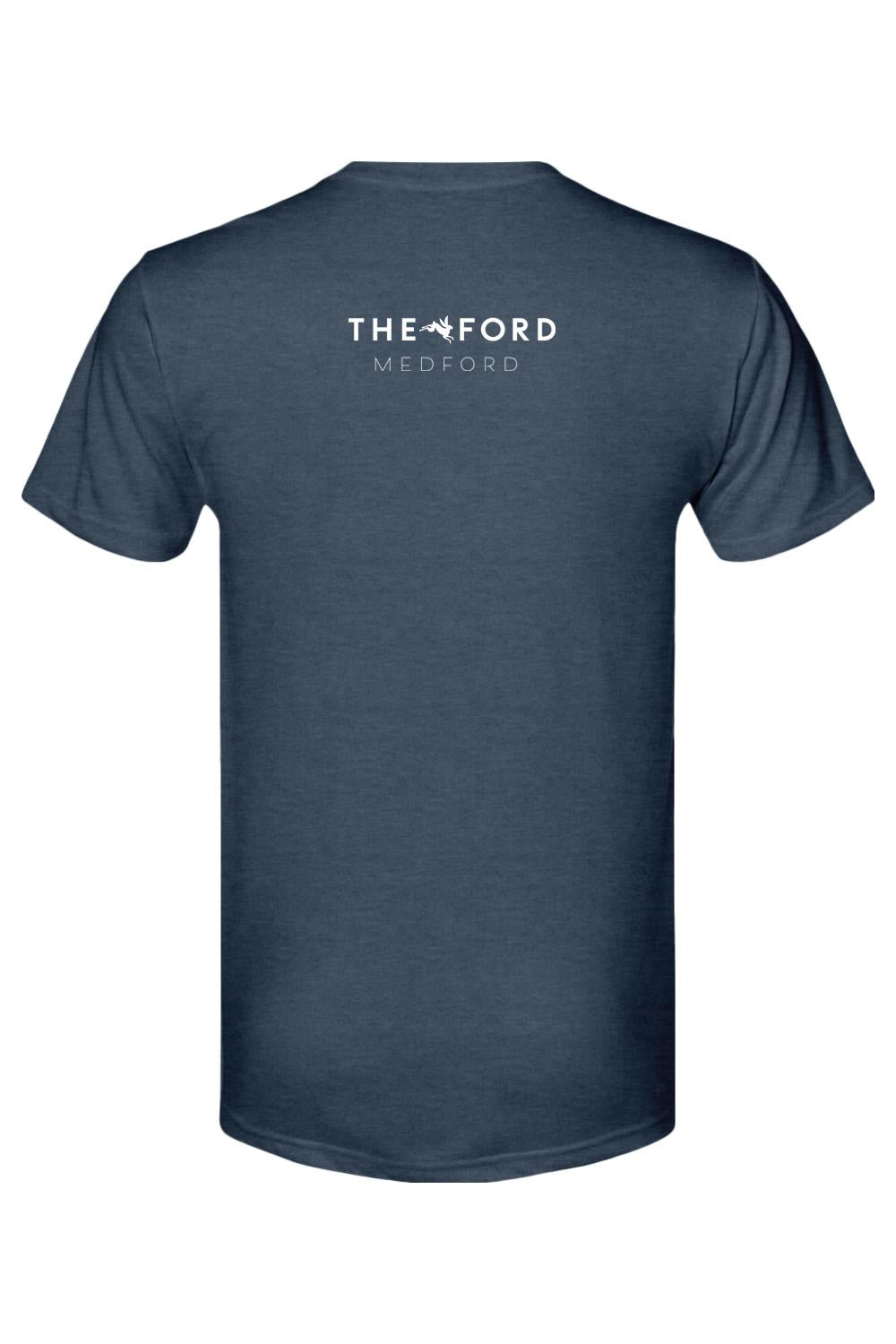 Back view of a navy blue triblend t-shirt featuring a white The Ford Medford logo with a small bunny graphic.