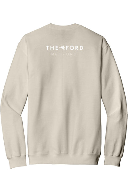 Beige crewneck sweatshirt featuring The Ford Medford logo in white on the back, made from soft cotton-poly blend.