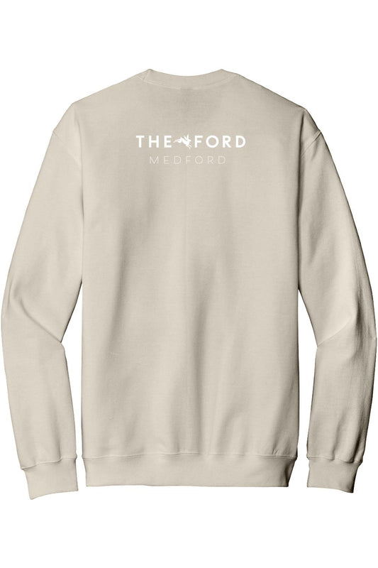 Beige crewneck sweatshirt featuring The Ford Medford logo in white on the back, made from soft cotton-poly blend.