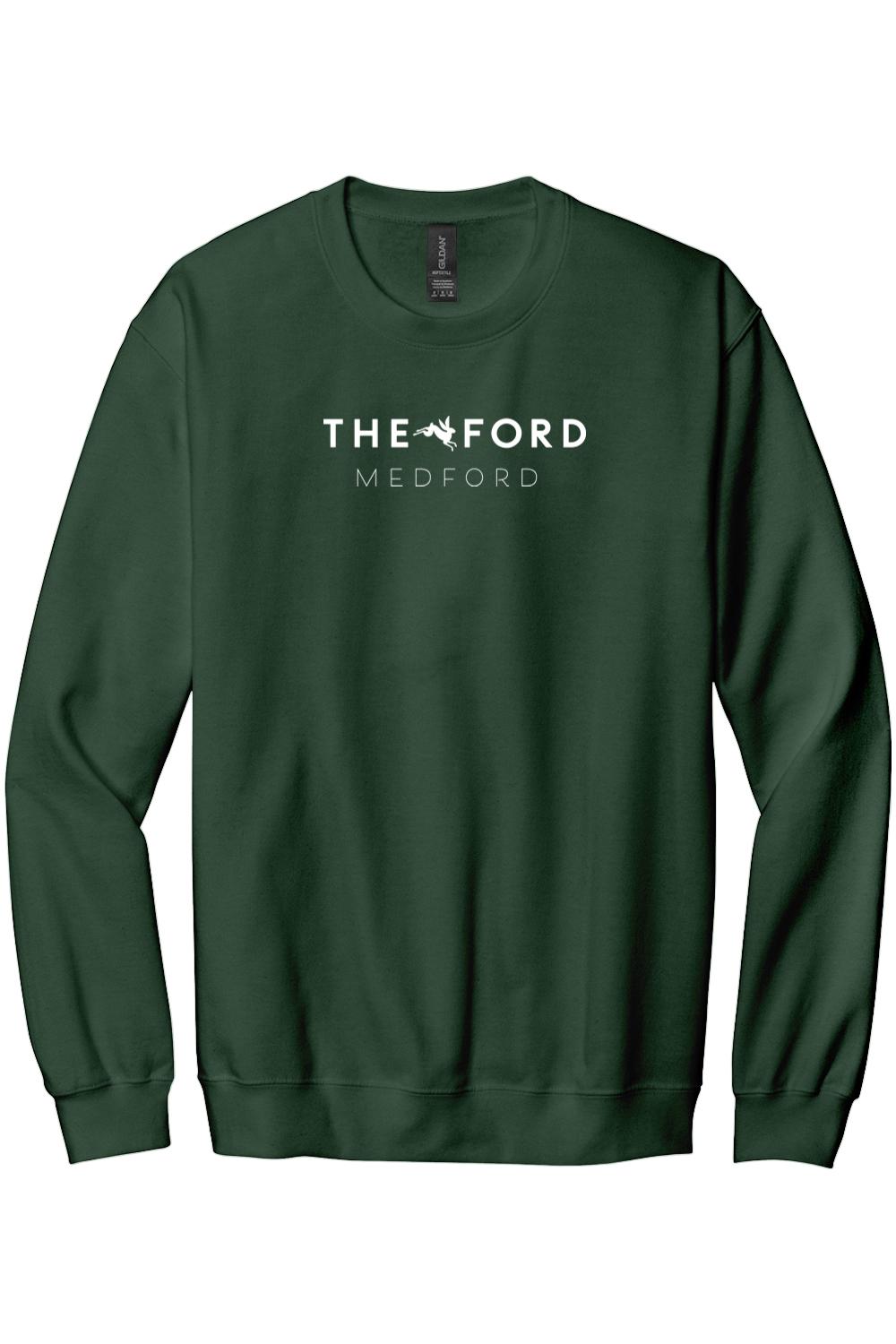 Dark green crewneck sweatshirt featuring white The Ford Medford text and a small logo graphic on the chest.
