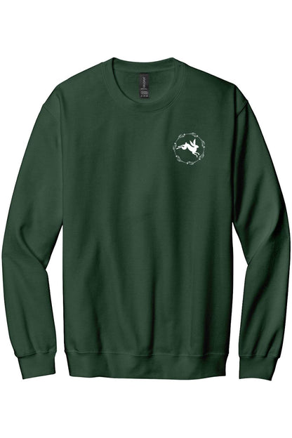 Forest green crewneck sweatshirt featuring a small white rabbit logo inside a circular floral wreath on the chest.