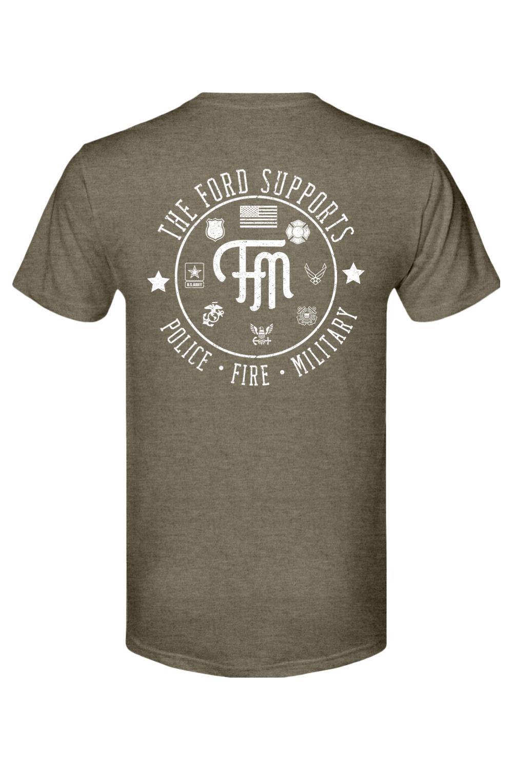 Olive green triblend t-shirt featuring a white graphic print honoring police, fire, and military personnel on the back.