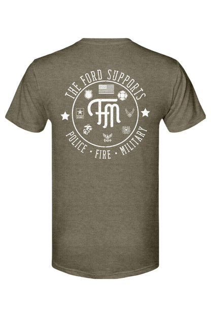 Olive green triblend t-shirt featuring a white graphic print honoring police, fire, and military personnel on the back.