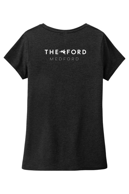 Black triblend V-neck women's tee featuring The Ford Medford logo in white on the back.
