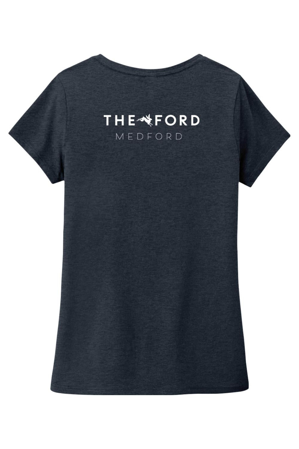 Dark heather grey women’s triblend v-neck tee featuring a white The Ford Medford logo on the back.