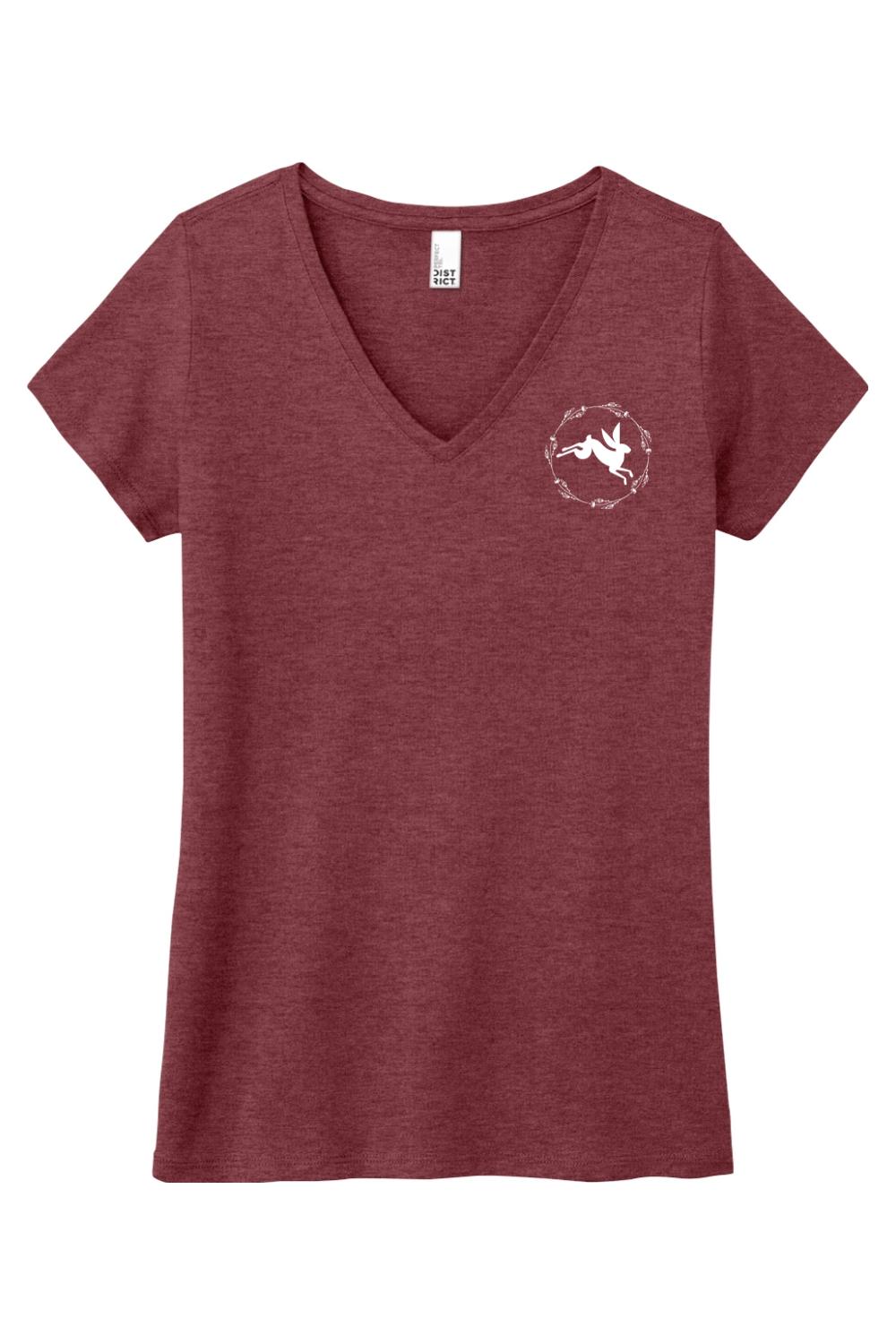 Maroon triblend women's v-neck tee featuring a white rabbit logo inside a floral wreath on the chest.