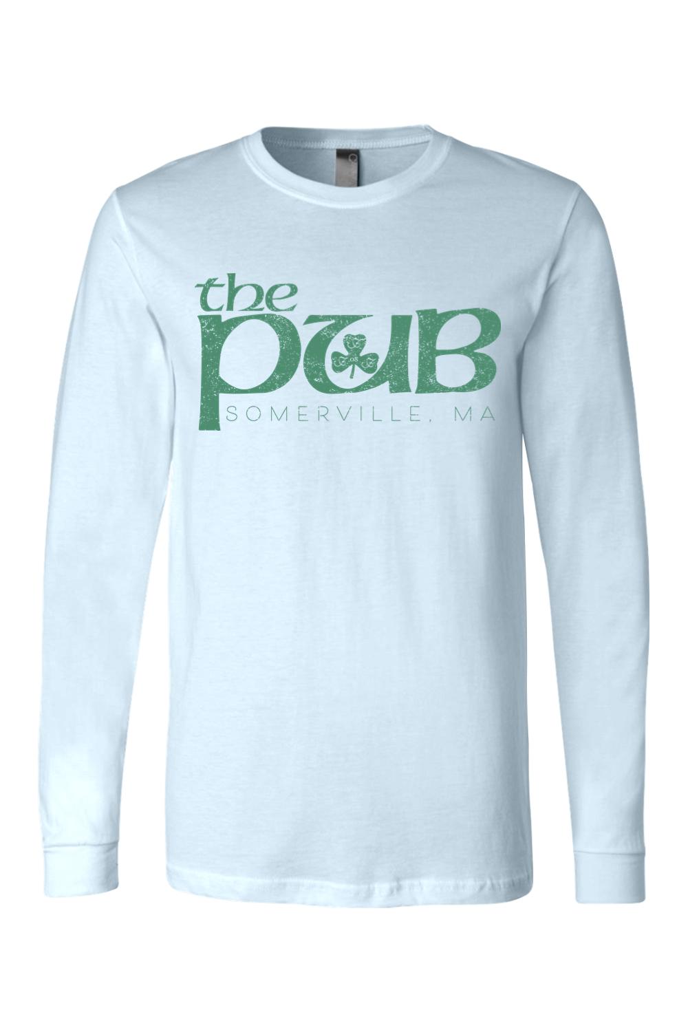 Light blue long sleeve jersey tee featuring a distressed green The Pub Somerville, MA logo with a shamrock.