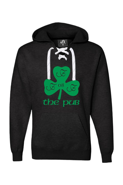 Black hooded sweatshirt with white lace-up neckline, featuring a green shamrock logo and The Pub text graphic.