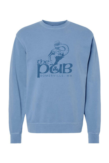 Blue pigment-dyed crewneck sweatshirt featuring The Pub Somerville elephant and beer mug graphic on the chest.