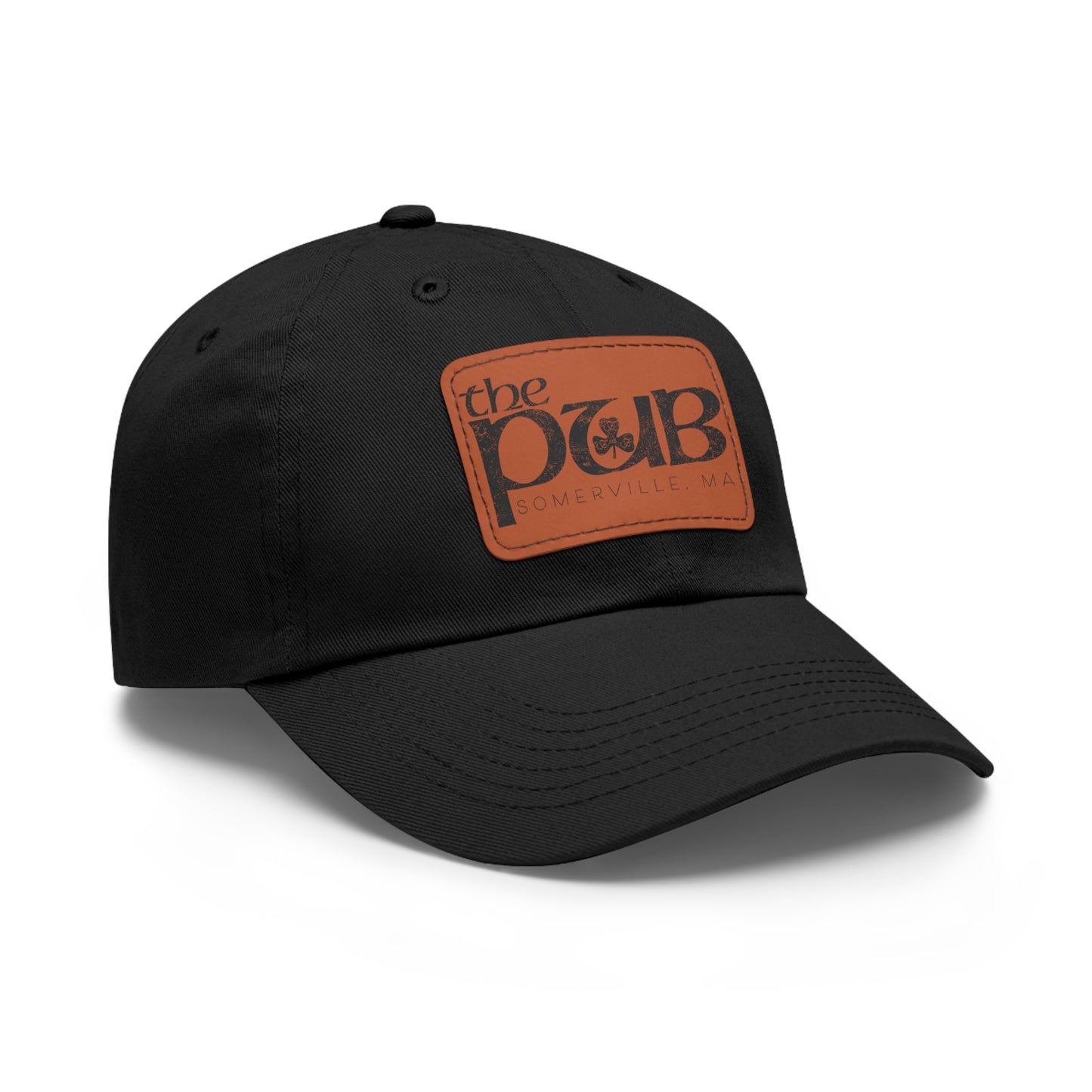 Black unstructured dad hat with a brown faux leather patch featuring The Pub Somerville logo.