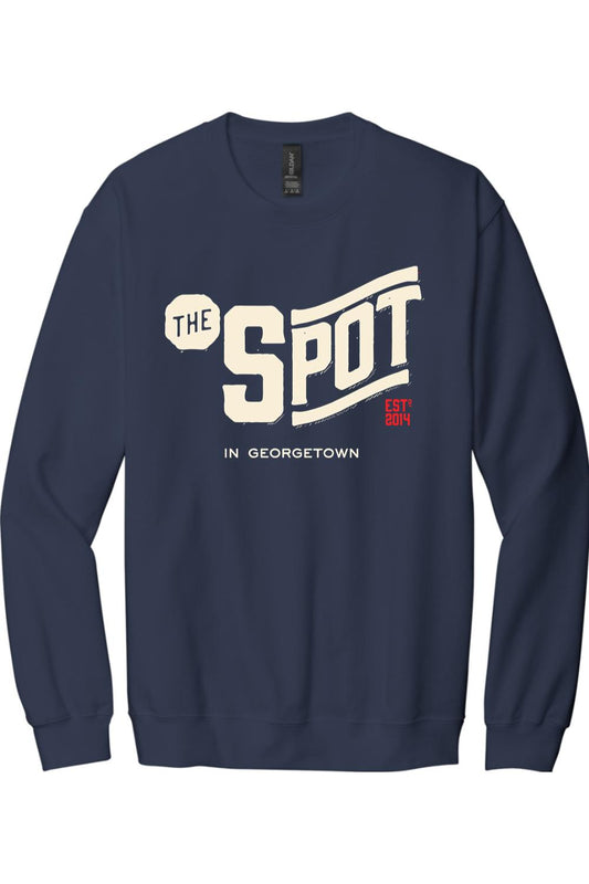 Navy blue cotton crewneck sweatshirt featuring The Spot Georgetown graphic logo in cream and red lettering.