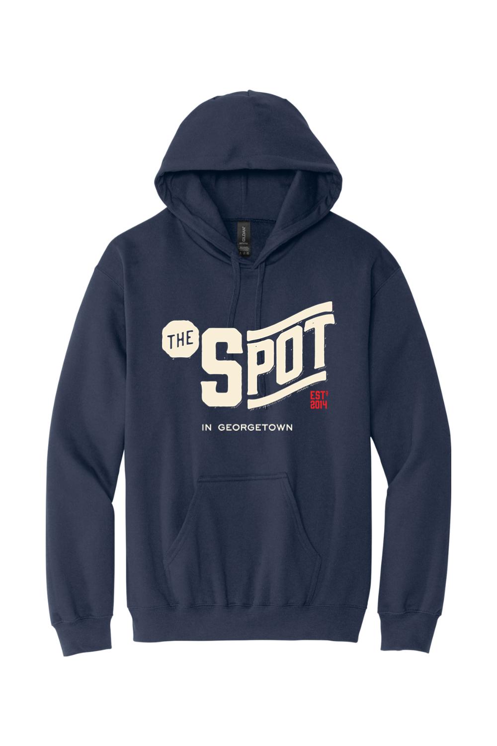Navy blue pullover hoodie with The Spot Georgetown graphic, featuring a drawstring hood and front kangaroo pocket.