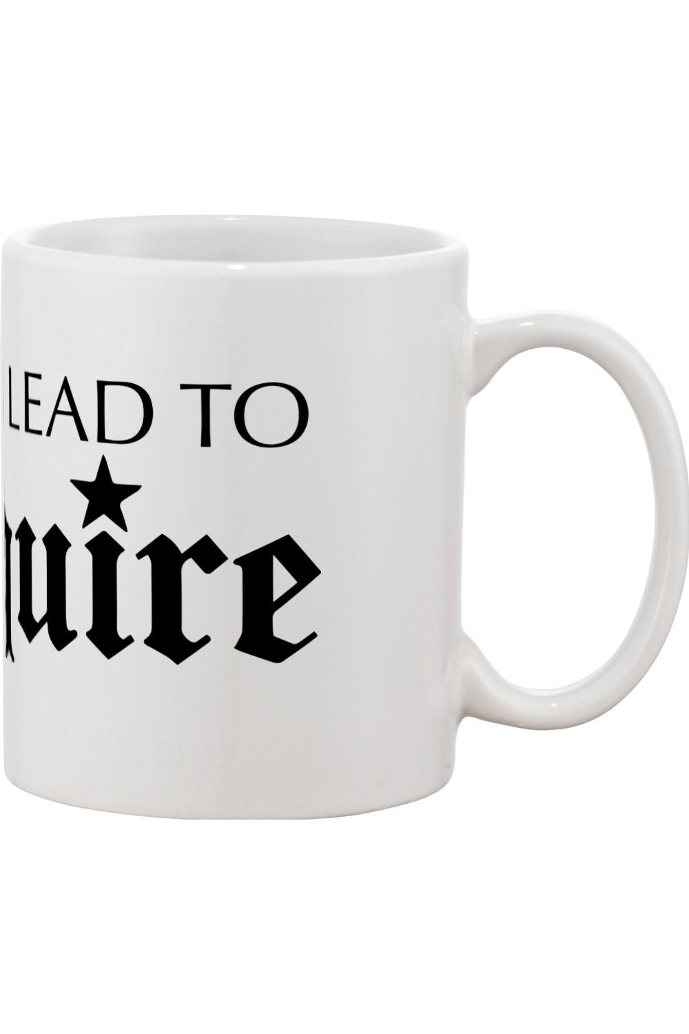 White ceramic mug with a comfortable handle featuring black text that reads Lead to Squire with a star icon.
