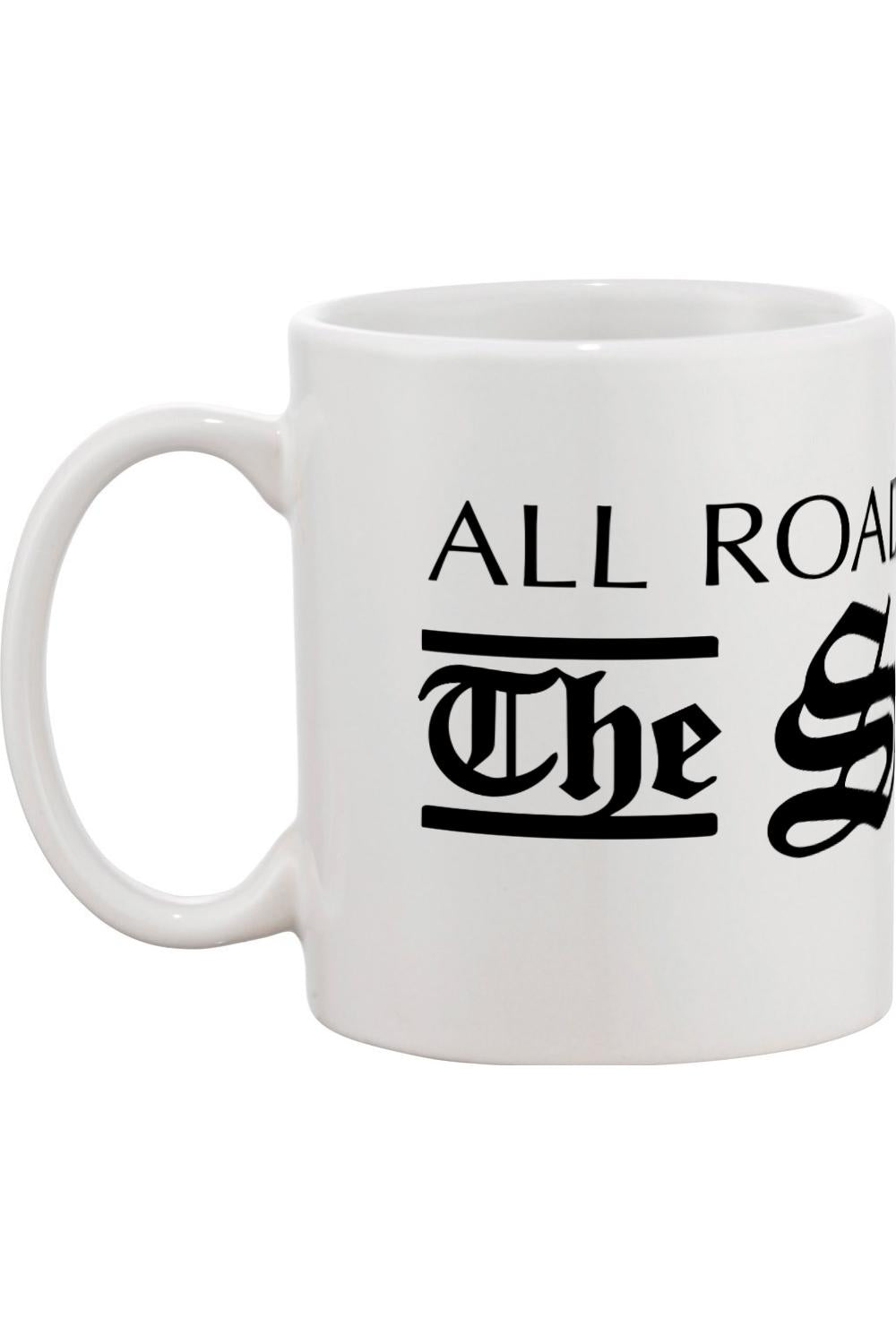 White ceramic mug featuring black text with a classic handle and durable design.