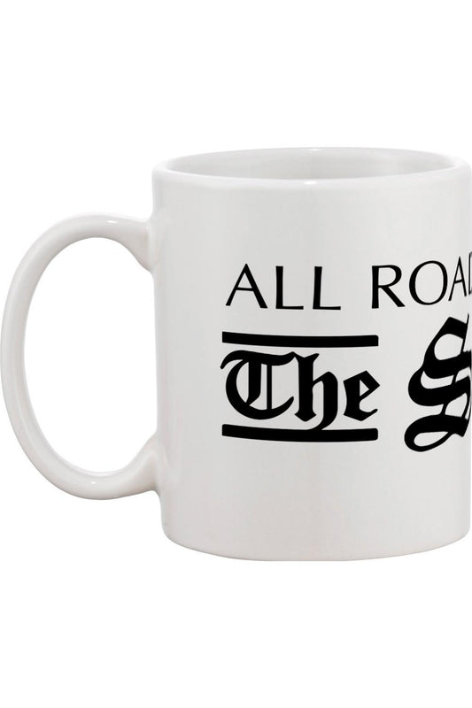 White ceramic mug featuring black text with a classic handle and durable design.