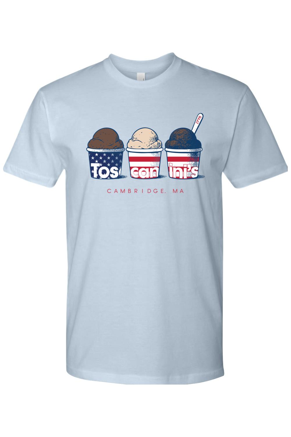 Light blue cotton t-shirt featuring three ice cream cups with patriotic American flag designs and Toscanini's branding.