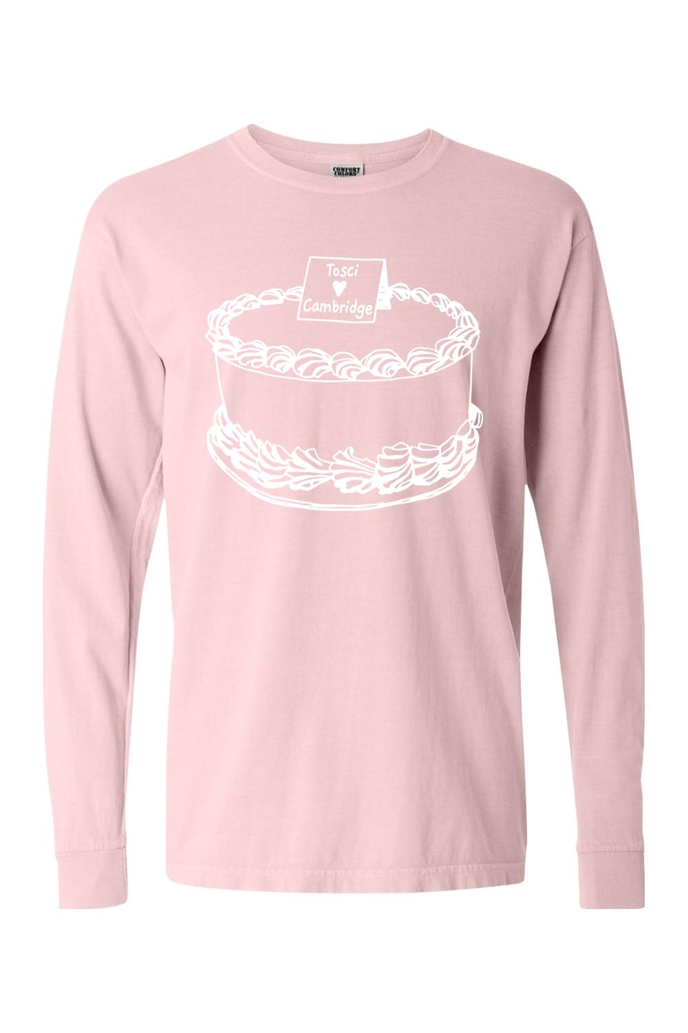Light pink Comfort Colors long sleeve cotton t-shirt with a white Toscanini's cake graphic on the chest.