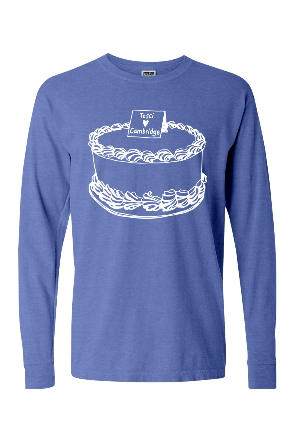 Blue Comfort Colors long sleeve t-shirt with a white line-art graphic of a cake labeled Tosci Cambridge.