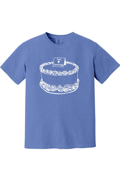 Blue Comfort Colors short sleeve t-shirt featuring a white line-art graphic of a cake labeled Tosci Cambridge.