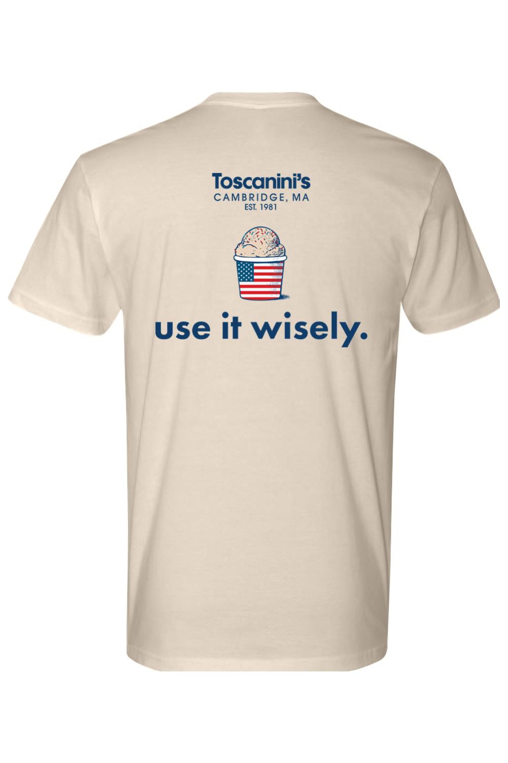 Beige cotton t-shirt featuring a Toscanini's ice cream cup graphic with an American flag design and the text use it wisely.
