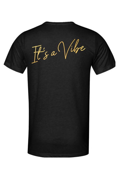 Black triblend t-shirt featuring the gold script text It's a Vibe across the upper back.