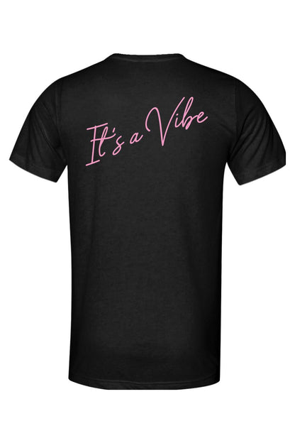 Black short-sleeve triblend t-shirt featuring It's a Vibe in pink cursive script on the back.