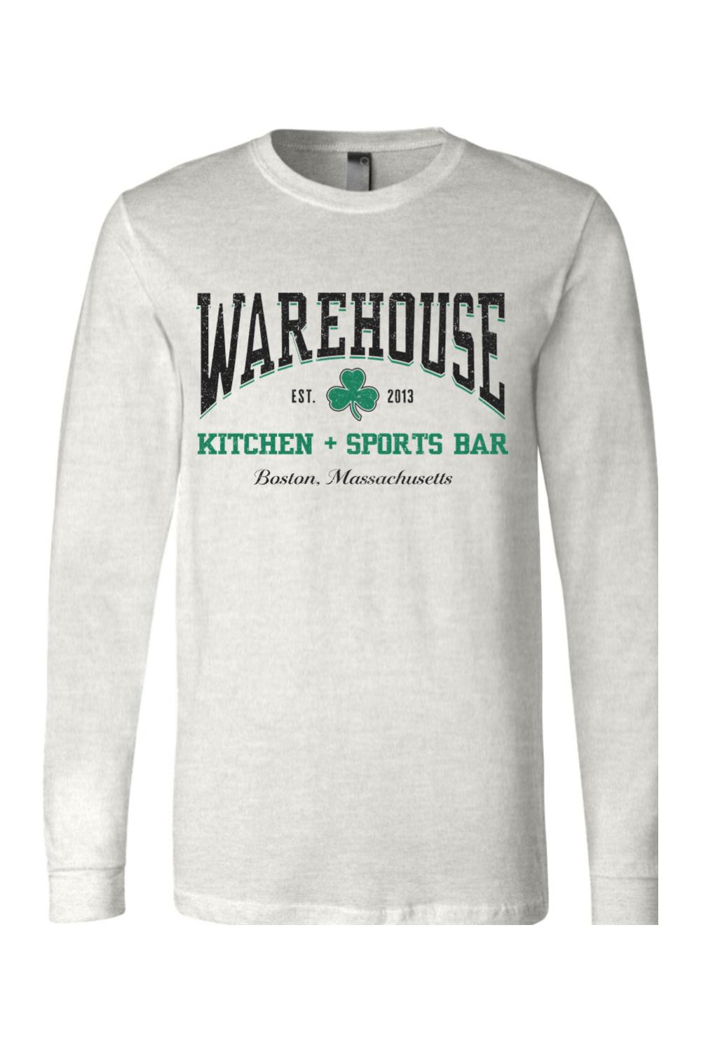 Light gray long sleeve cotton t-shirt with Warehouse Kitchen + Sports Bar Boston clover logo graphic on the chest.