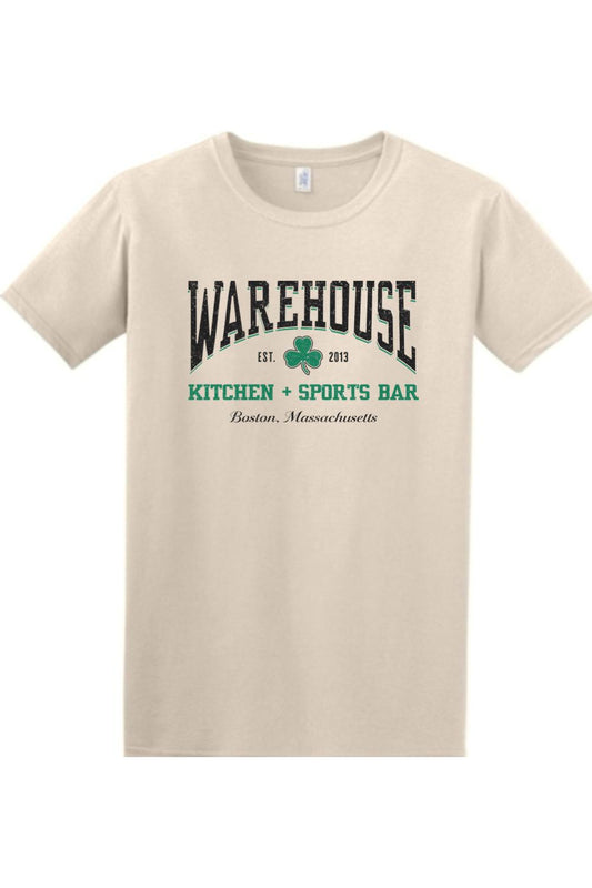 Beige relaxed-fit cotton t-shirt featuring a Warehouse Kitchen + Sports Bar Boston logo with a green clover graphic.