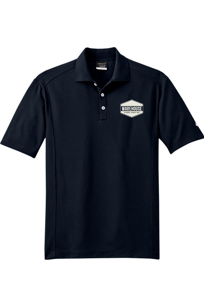 Navy blue Nike Dri-FIT polo shirt featuring the Warehouse Kitchen + Sports Bar logo on the chest.
