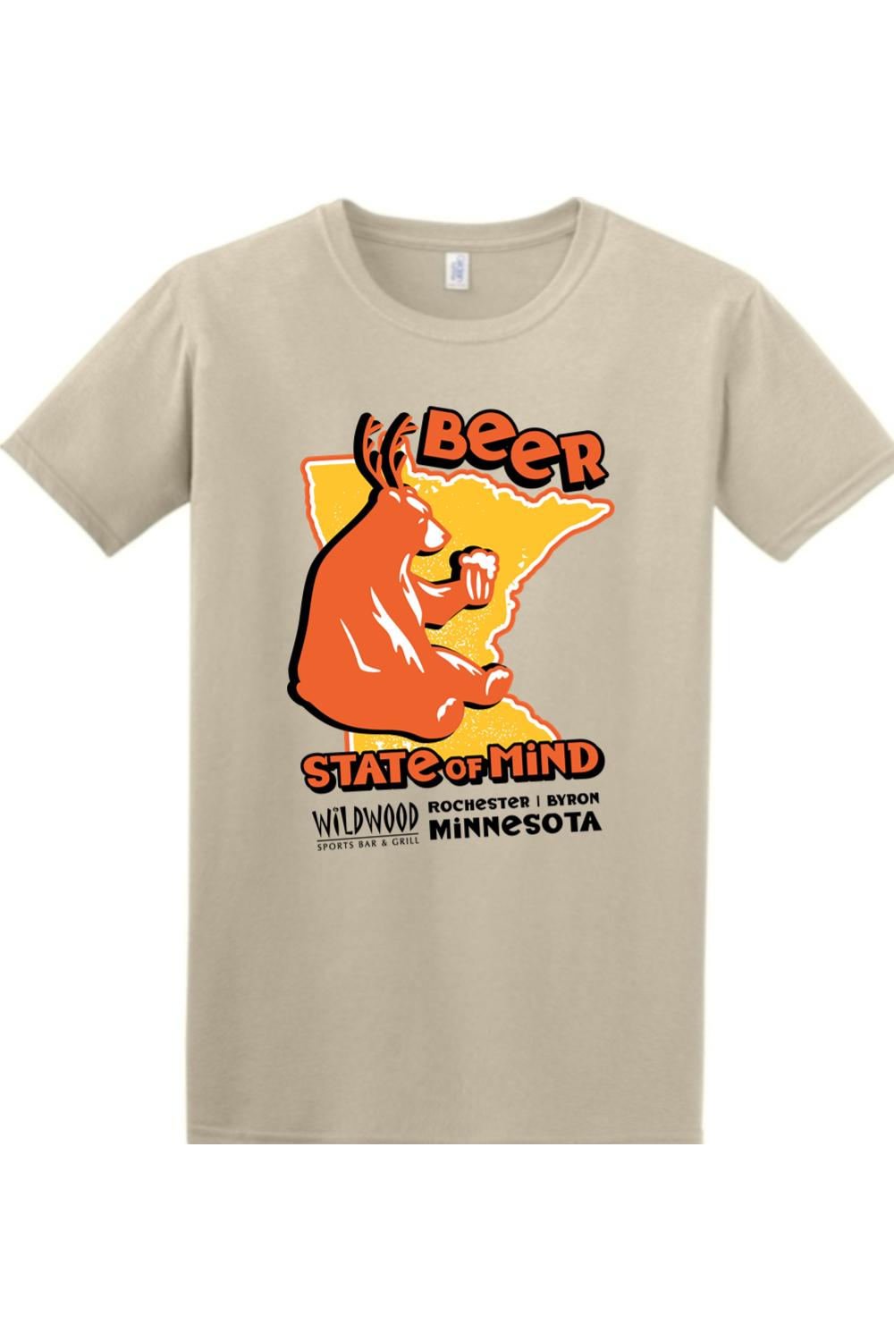 Beige cotton t-shirt featuring a graphic of a bear holding a beer over a Minnesota map with Wildwood Sports Bar branding.