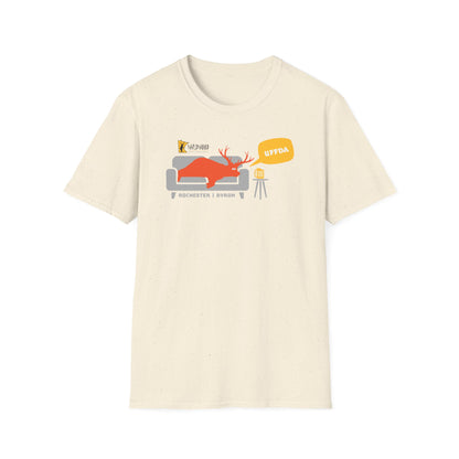 Natural speckled cotton t-shirt featuring a graphic of a red deer on a couch saying UFFDA with a beer nearby.