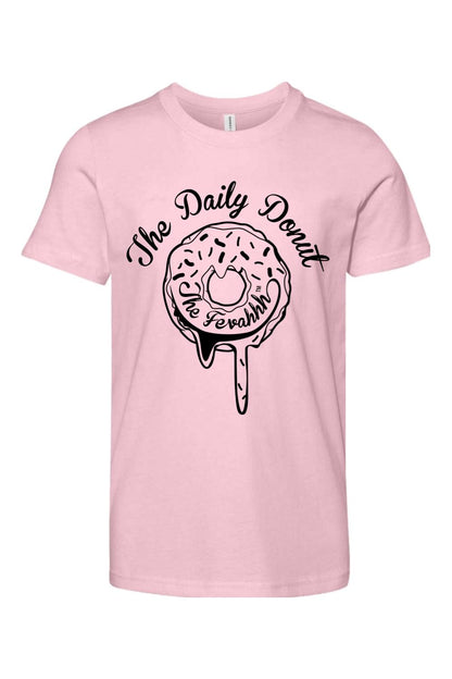 Soft pink youth cotton t-shirt featuring a black graphic of a dripping donut with The Daily Donut text.