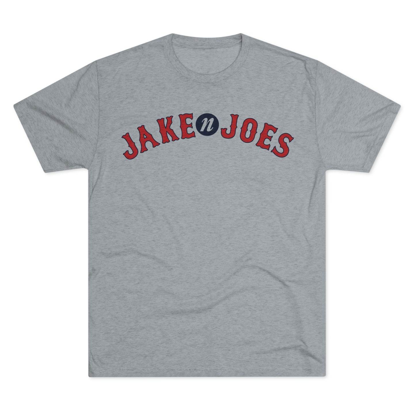 Grey tri-blend short-sleeve t-shirt featuring a red and blue Jake n JOES Boston baseball-style logo on the chest.