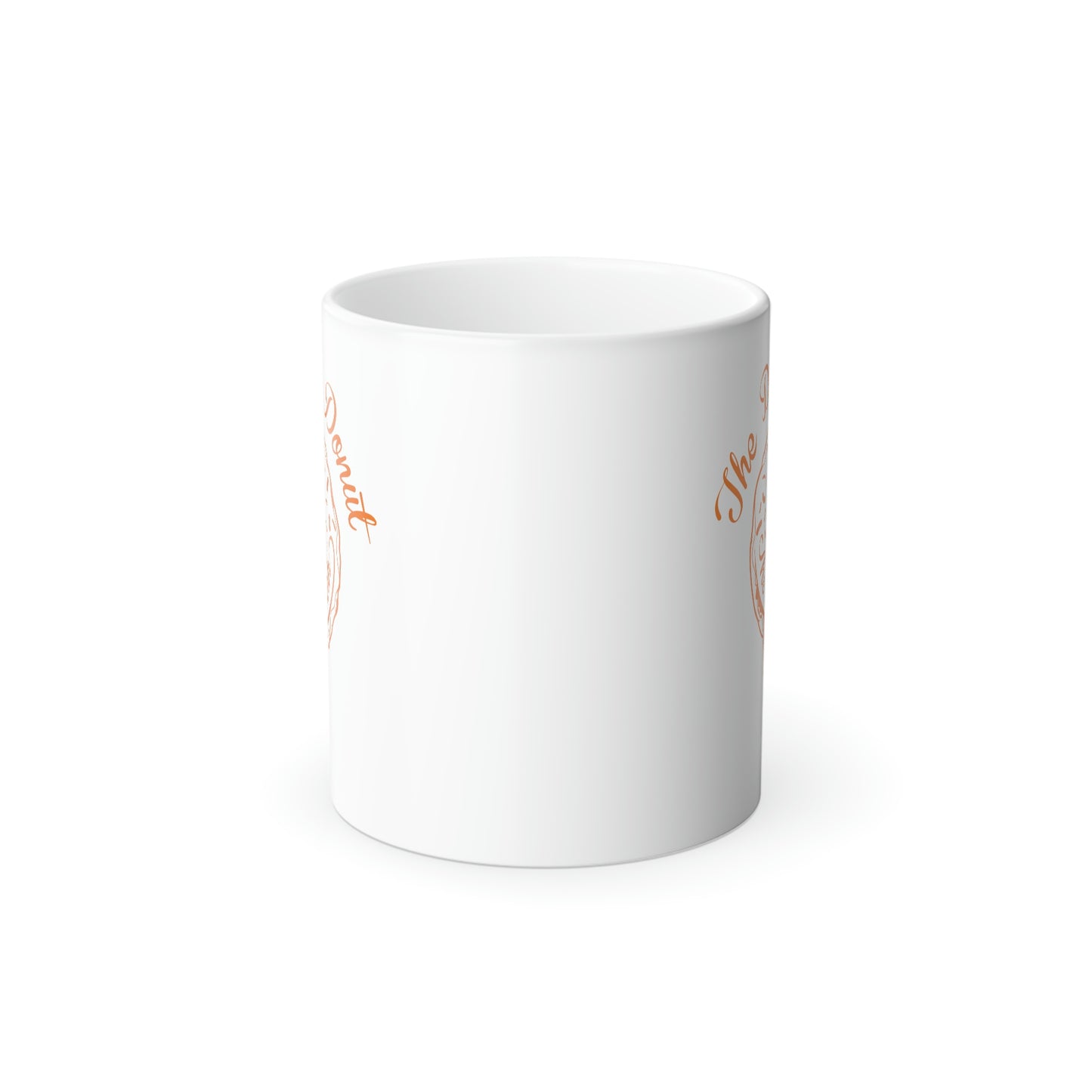 11oz white ceramic mug with The Daily Donut orange graphic, glossy finish, and C-shaped handle.