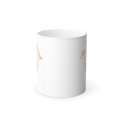 11oz white ceramic mug with The Daily Donut orange graphic, glossy finish, and C-shaped handle.