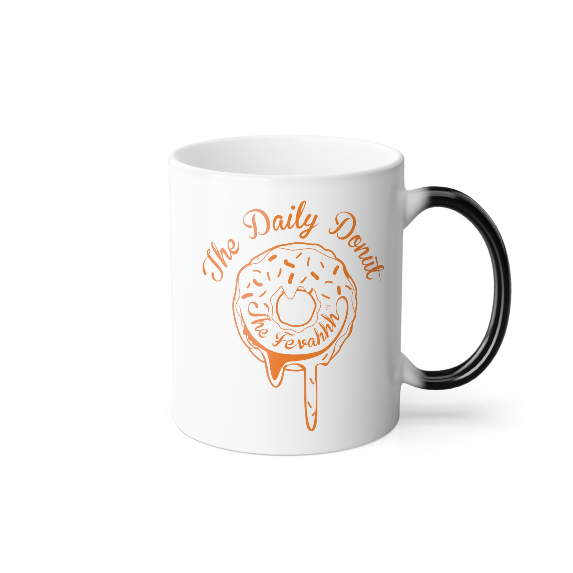 11oz ceramic heat-reactive mug with white finish, black handle, and orange The Daily Donut graphic design.