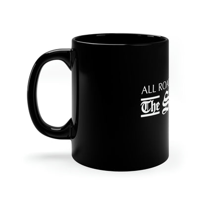 11 oz black ceramic mug with a C-handle featuring white text that reads All Roads The Squire.