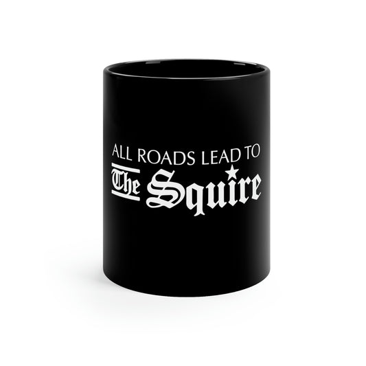 11 oz black ceramic mug featuring the white text All Roads Lead to The Squire with a C-handle design.