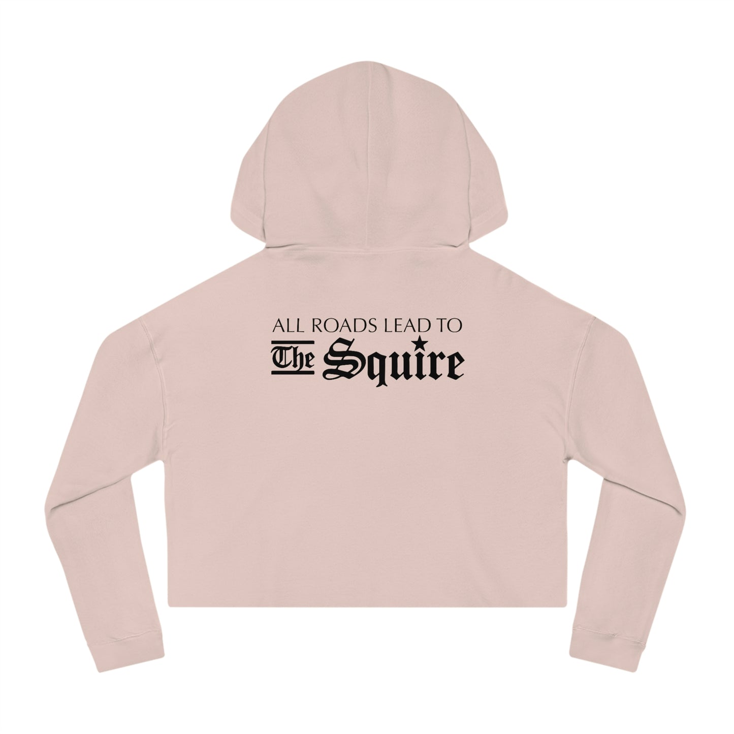 Light pink women's cropped hooded sweatshirt featuring black text on the back that reads All Roads Lead to The Squire.