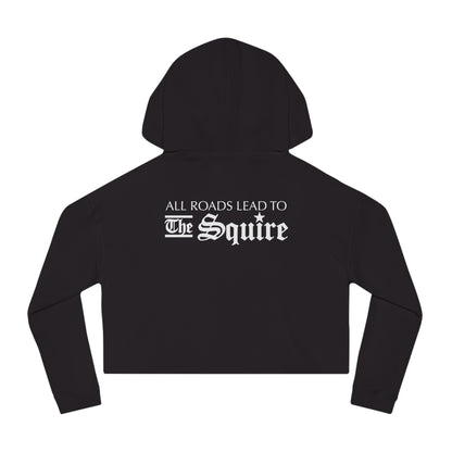Black cropped hooded sweatshirt featuring white text on the back that reads All Roads Lead to The Squire.