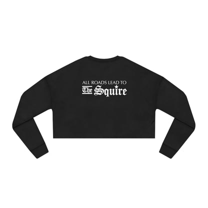 Black women's relaxed-fit cropped sweatshirt featuring white All Roads Lead to The Squire text on the back.
