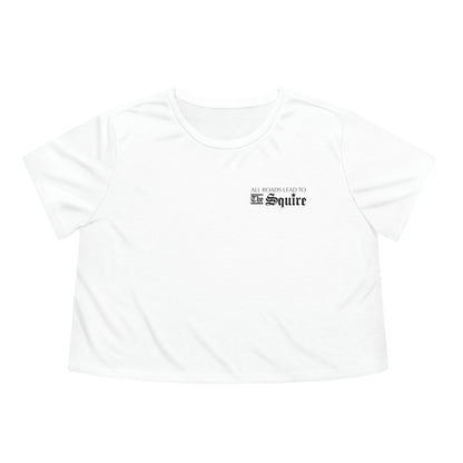 White flowy women's cropped tee with All Roads Lead to The Squire text printed on the chest.
