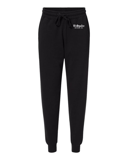 Black fleece women's sweatpants with an elastic drawstring waist, cuffed ankles, and The Squire Revere, MA logo.